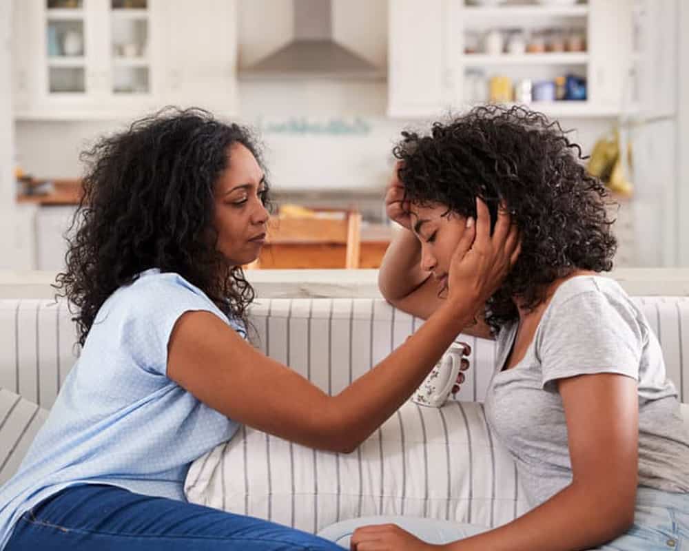 Mother Talking With Unhappy Teenage Daughter