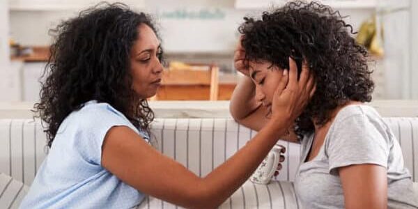 Mother Talking With Unhappy Teenage Daughter